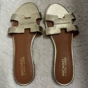Gold flat H sandals - size 9